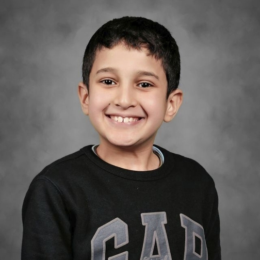 Adam Boualam as a Duloc Performer and Flag Waver (White Rabbit) head shot